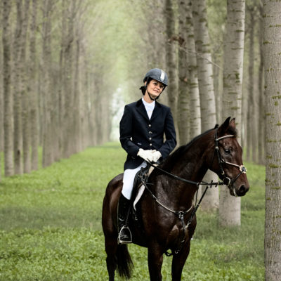 Field Horsewoman Waiting in a Poplar Grove